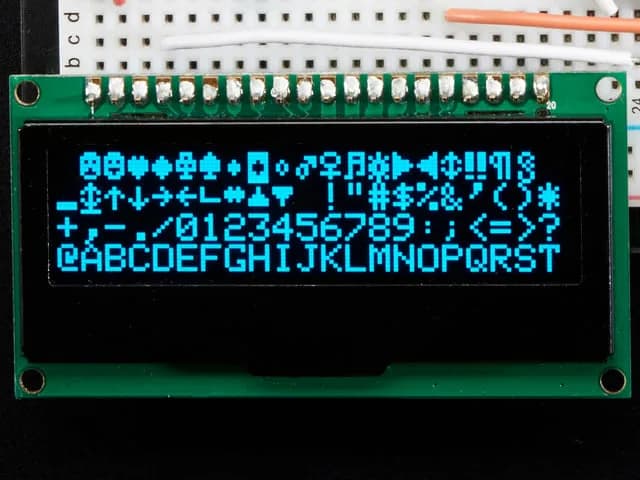 Комплект модуля монохромного графического OLED-дисплея с диагональю 2,3 дюйма и разрешением 128x32 пикселей.